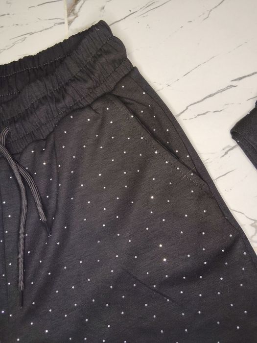 Pantaloni evazați cu pietricele de damă