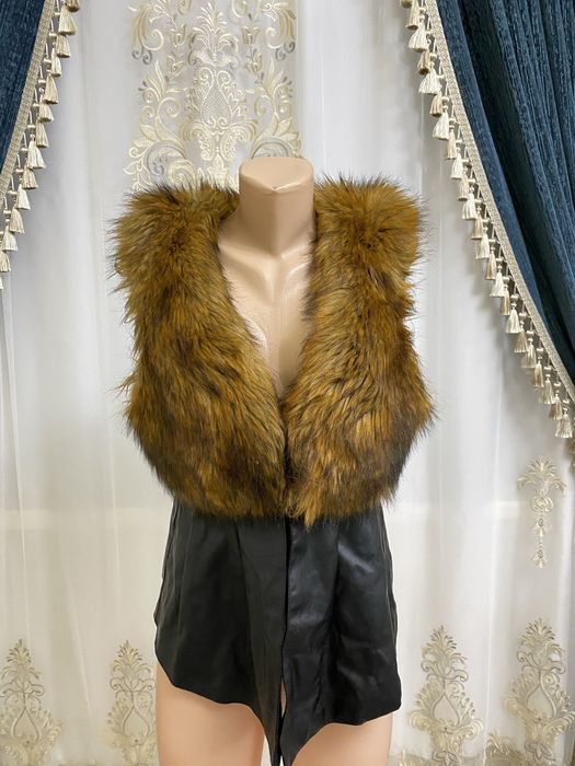 Kostyum bezrukavka, koja haqiqiy mex