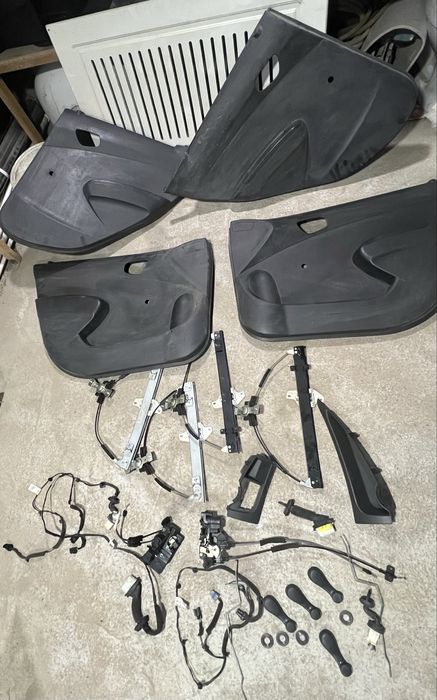 Обшивки, стеклоподъемники, вставки Chevrolet Spark
