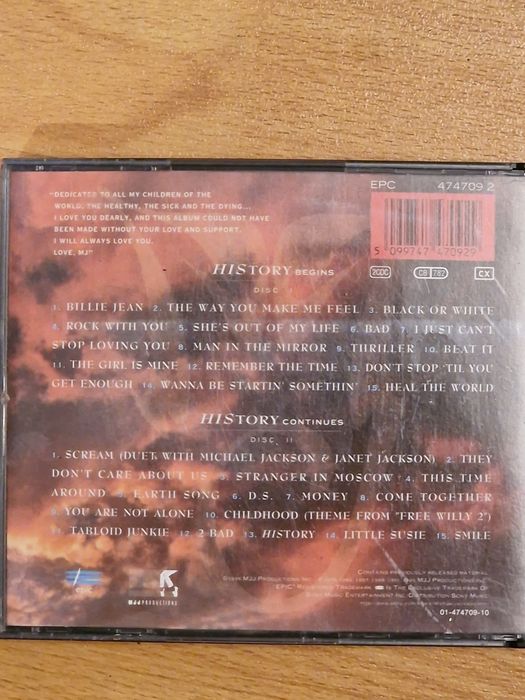 Set 2 CD-uri album Michael Jackson cu autograf original M.J.