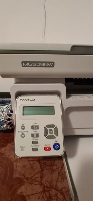 Imprimantă multifunctionala laser