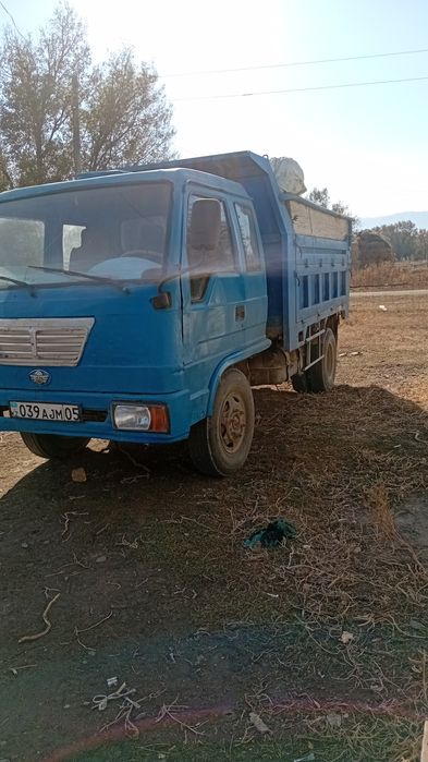 Жүкті өзі түсретін машина