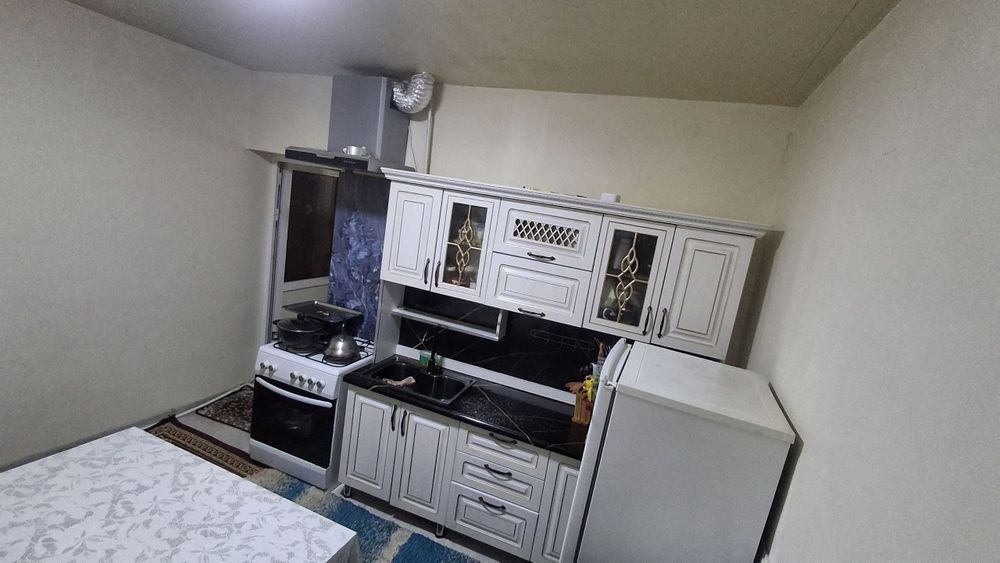 Mirzo Ulugʻbek tumani.  Carbon MFY. Shabboda 1-tor. 8-uy.