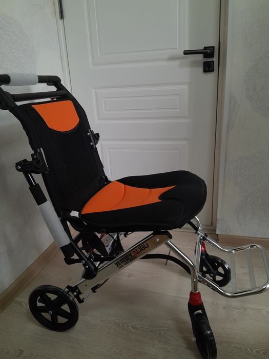 Инвалидная коляска