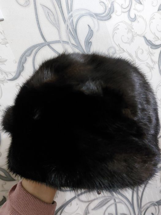 новыи норкавая шапка не одевала