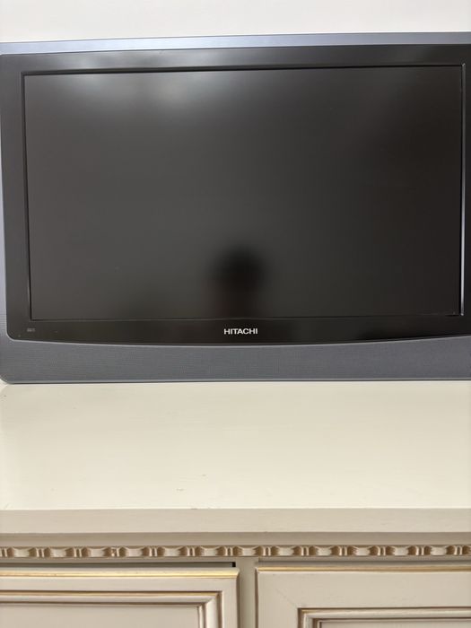 Телевизор почти новый