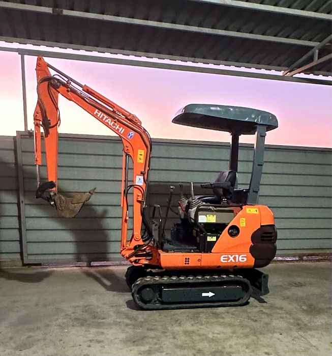 Miniexcavator hitachi/motor kubota in trei pistoane