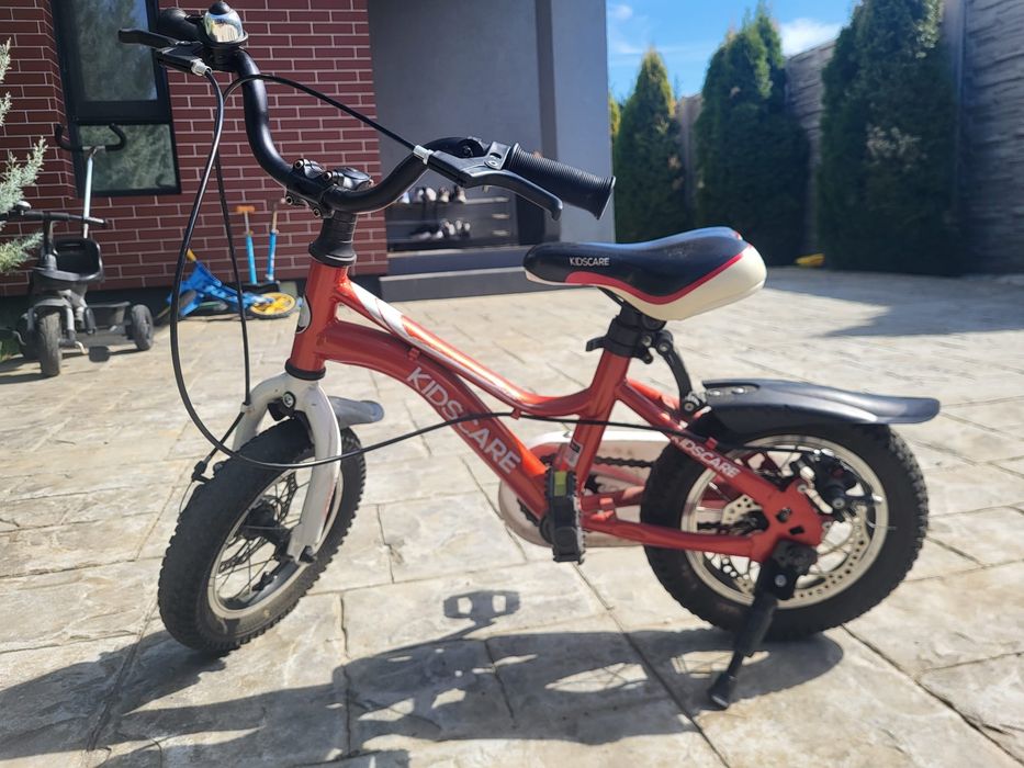 Bicicletă copii Kidscare 12 inch – stare foarte bună + roți ajutătoare