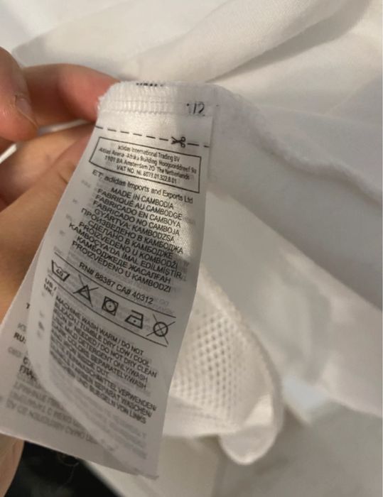 Tricou Adidas Originals alb cu detaliu plasă (mesh) si logo portocaliu