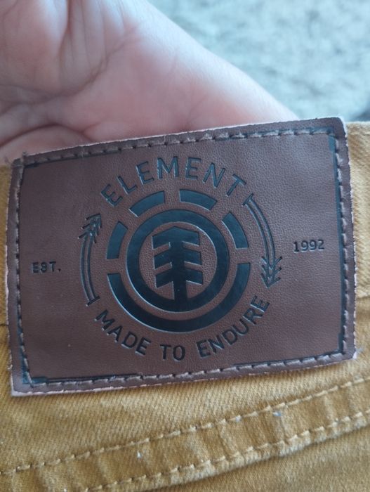 Pantaloni pană de culoare maro