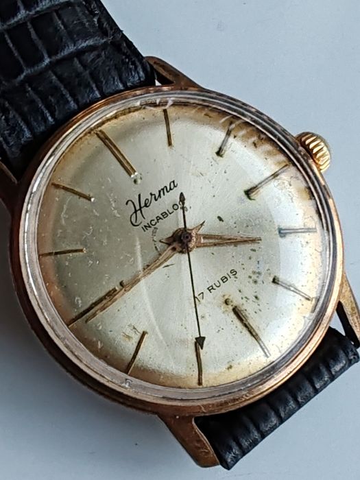 Ceas Herma Placat cu aur Int. Manuala Funcționează excelent!