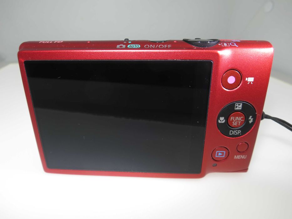 Canon IXUS 125 компактен цифров фотоапара в оранжево червен цвят уникат и отлично състояние като НОВ, работи перфектно