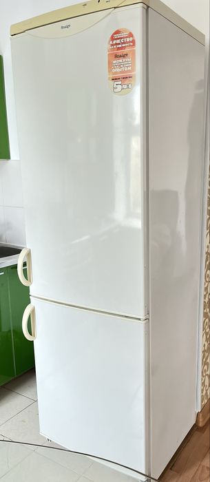 Продам 2х камерный холодильник “Snaige”