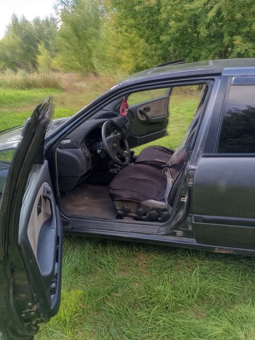 Нисан примера бензин