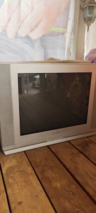 Телевизор, в рабочем состоянии.