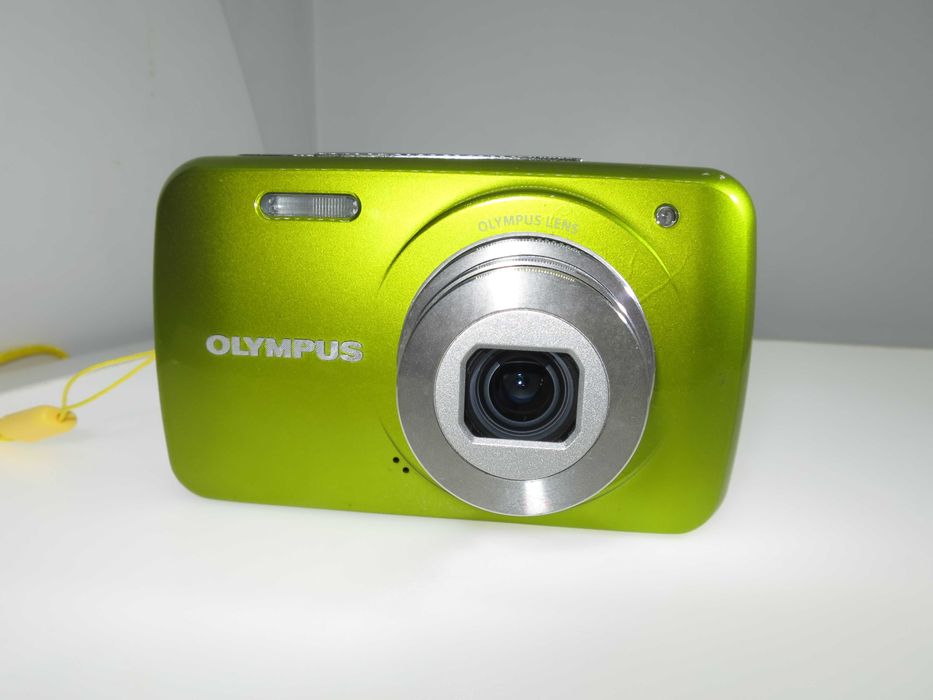 Olympus VH 210 ултра компактен фотоапарат в страхотен свеж зелен цвят и състояние като НОВО, тестван и работи отлично, пълен комплект