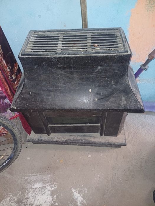 Каменный печка идеал