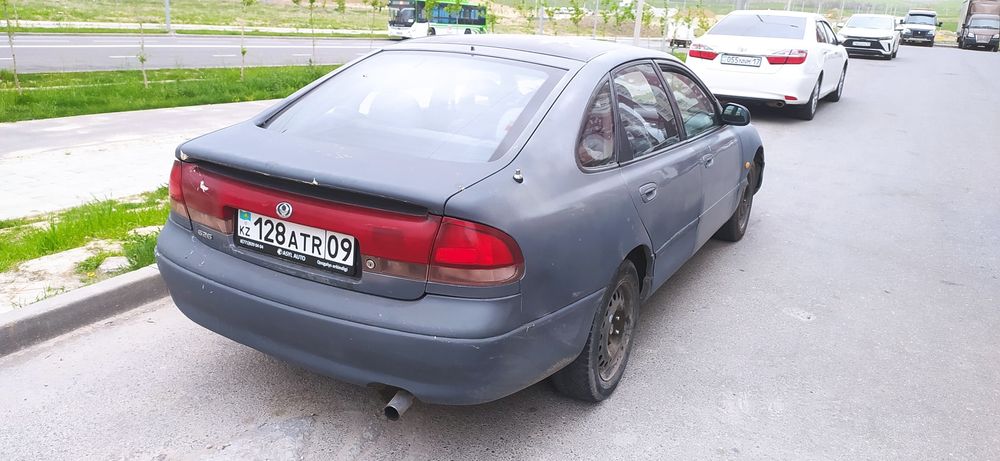 Мазда 626 Кронос