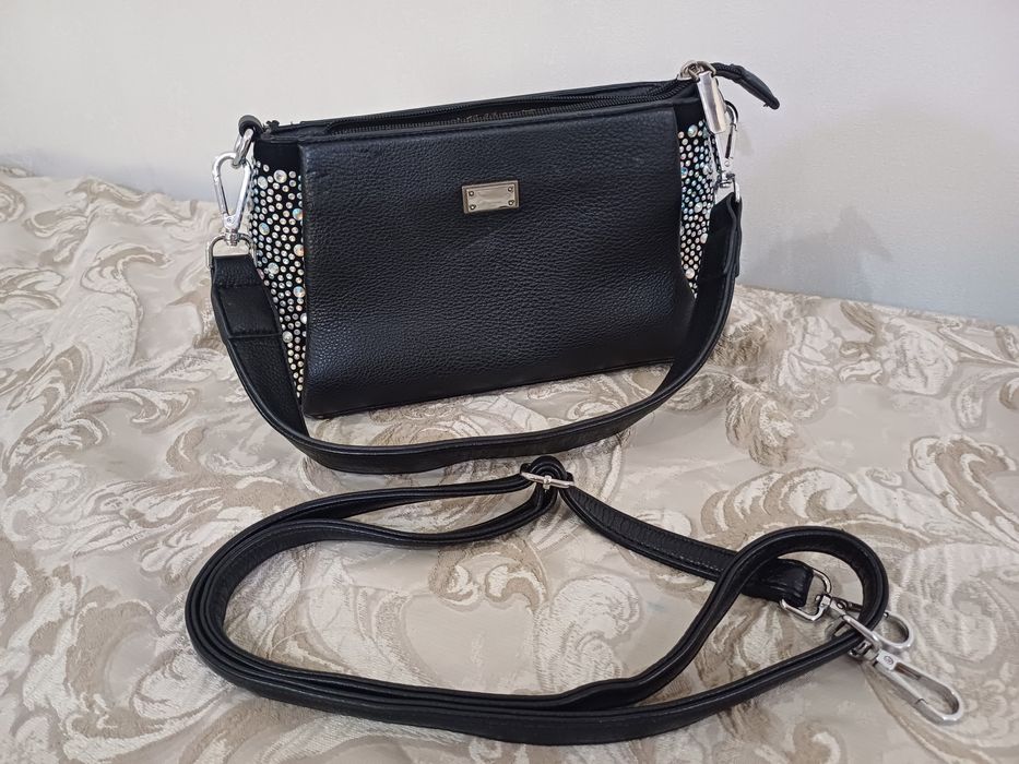 Кожаная сумочка с ремешками