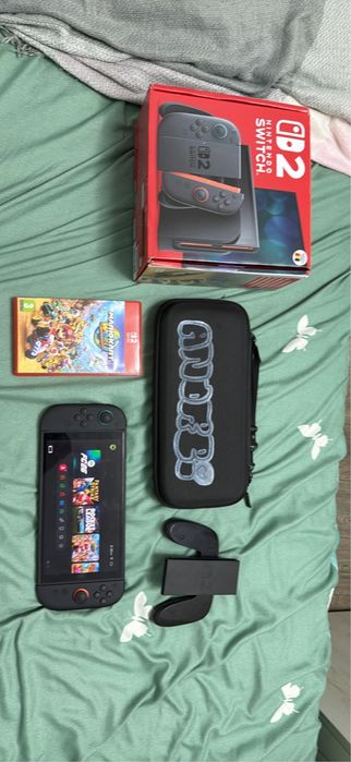 Nintedo switch 2 cu mario kart si fc 26 +carcasa si folie deja pusa oe consola