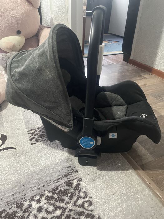 Продам  детскую коляску TOMIX 3 в 1