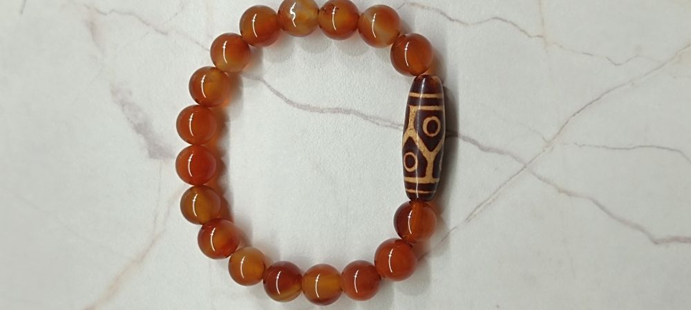 Бусина Дзи 6 глазка