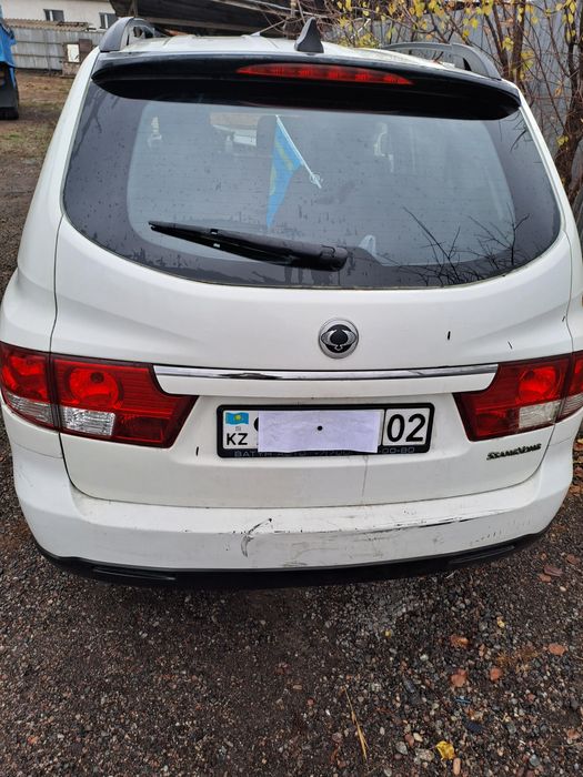 Саненг кайрон 2013г бензин