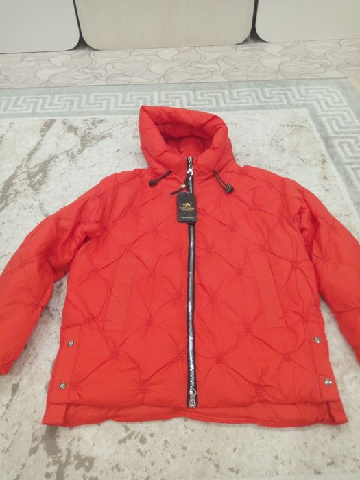 Продам новые зимние куртки