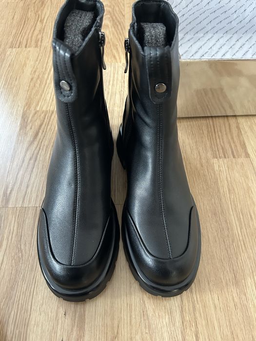 Продам новые зимние сапоги