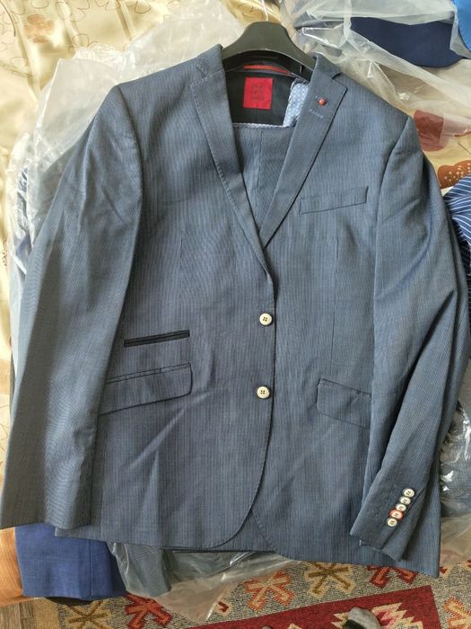 Мужские костюмы б/у