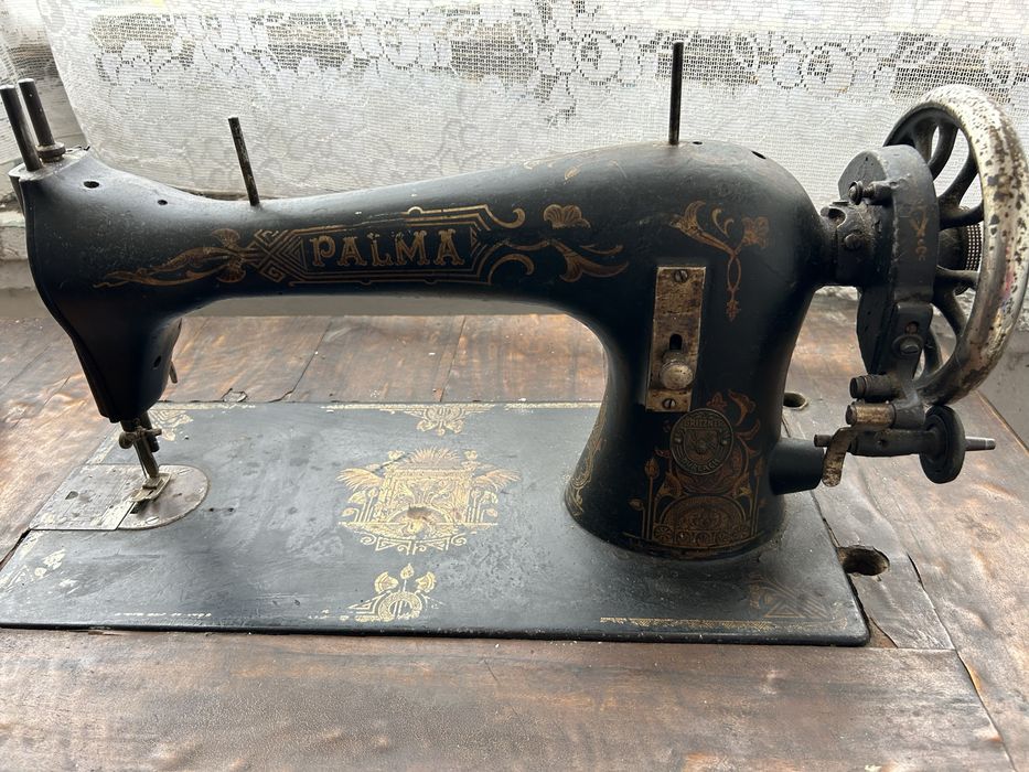 Masina de cusut Singer