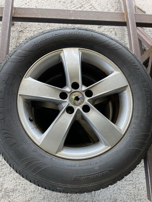 Set jante aliaj R16 5x105 Opel cu anvelope de iarna 215 65 R16