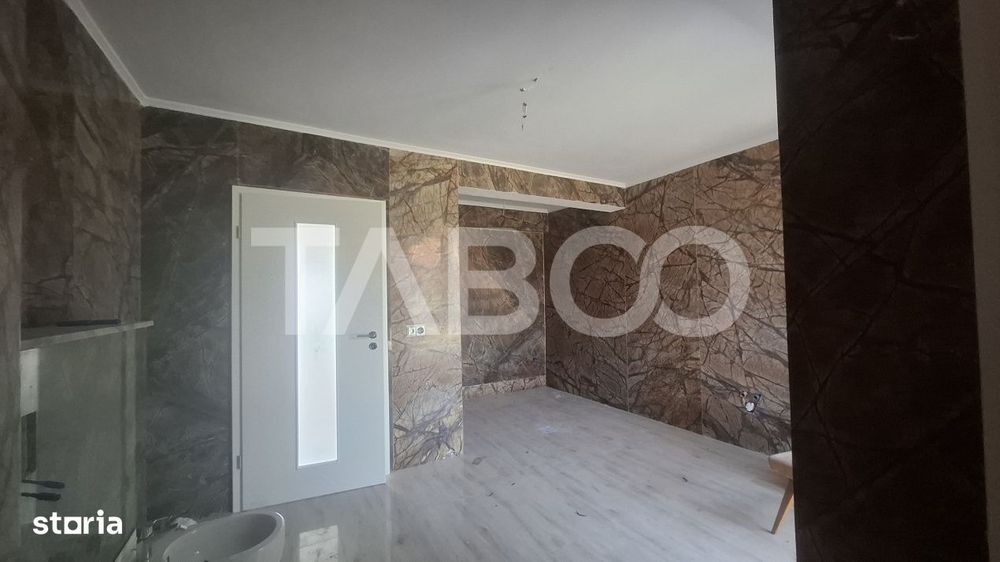 Casa de vanzare 405 mp utili 2 garaje 250 mp terase Slimnic Sibiu