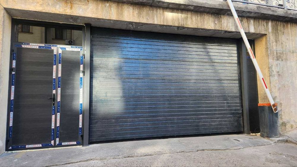 Подъемные секционные ворота. Испания. Erreka