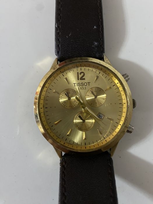 Часы Tissot золотистые
