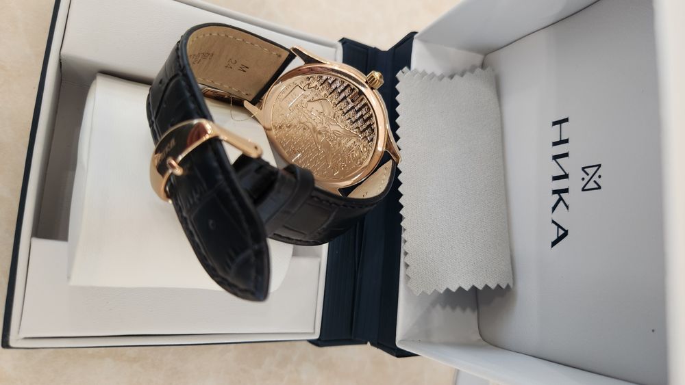 Золотые часы Ника