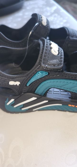 Продам сандали новые