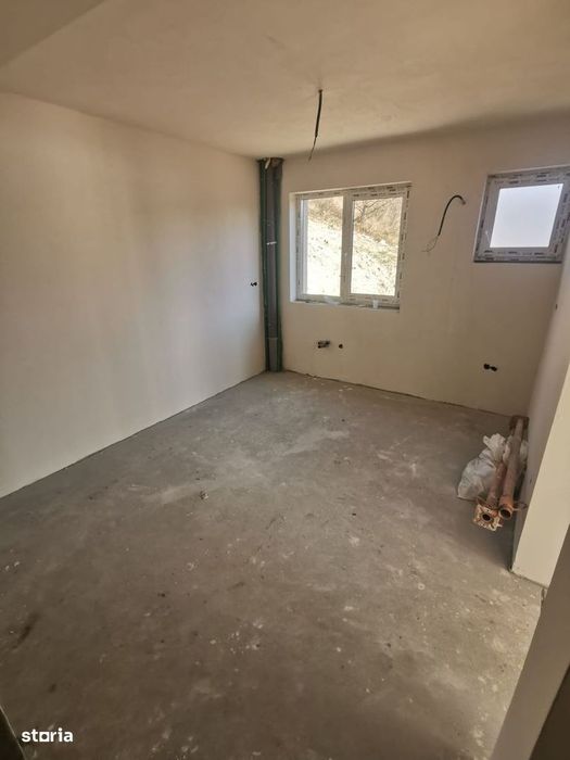Casa individuala cu terasa,panorama spre lac, garaj, teren 300mp
