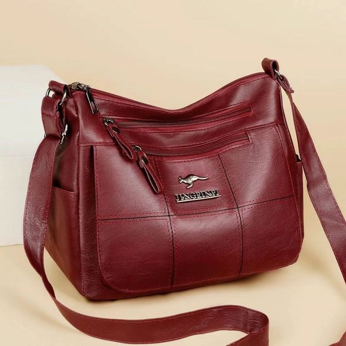 Продается новая  женская сумка бордового цвета