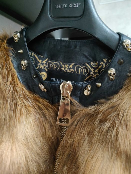 Продам кожаную жилетку