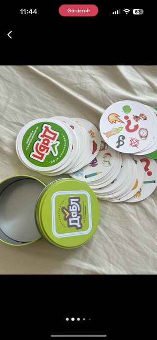Книга на казахском и настольная игра