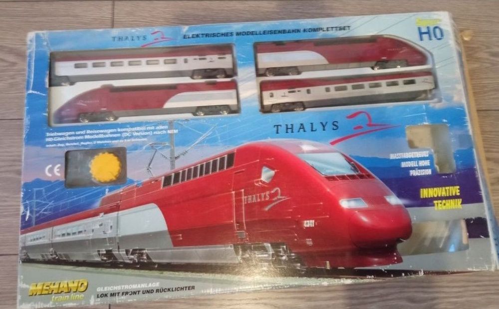 Mehano TGV Set trenuleț electric HO
Locomotiva
+
2 vagoane
+
T