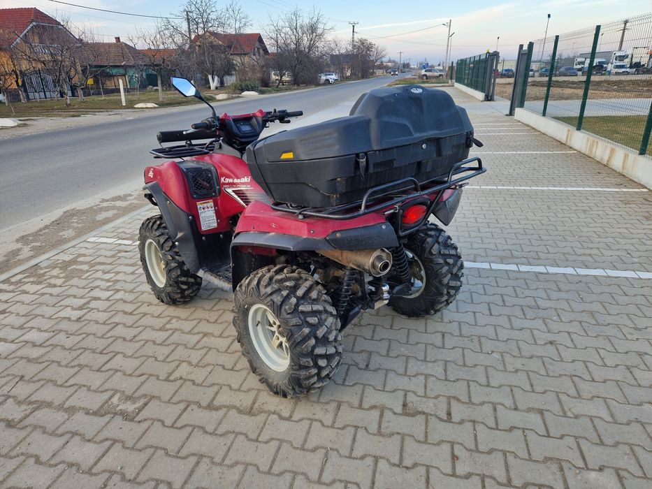 Vând sau schimb ATV Kawasaki