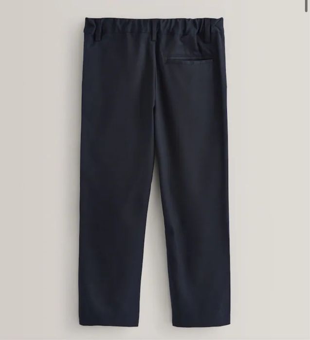 Продам новые школьные брюки Next