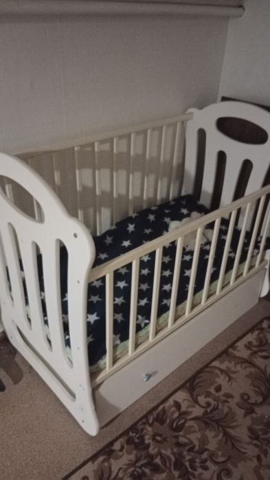 Детская кроватка качалка