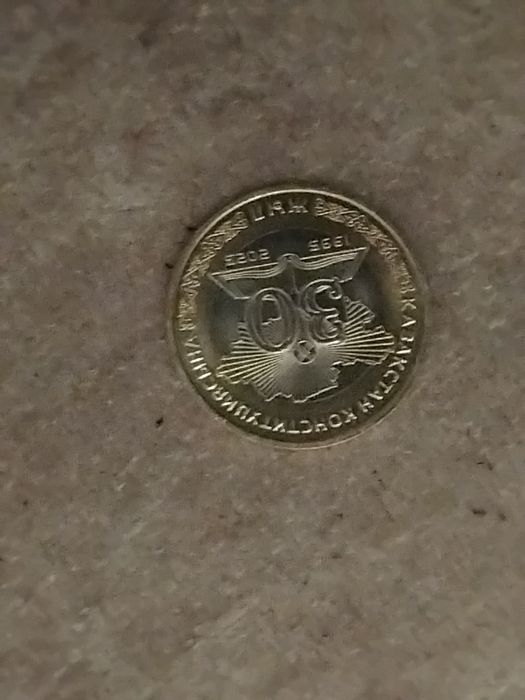 Продам монету 30 лет 100тг