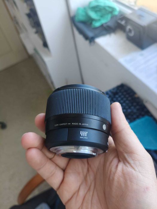 Vand Sigma 56mm f/1.4 DC DN Contemporary pentru Micro Four Thirds MFT M3/4, stare ca nou