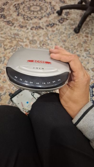 Продам модем ECOM 56K