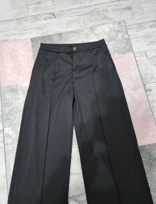 Pantaloni largi femei