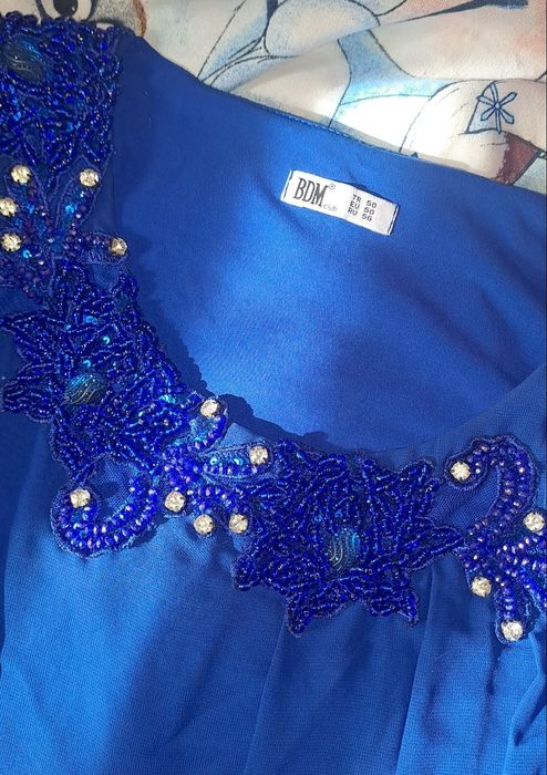 Toyga kiyishga koylak.